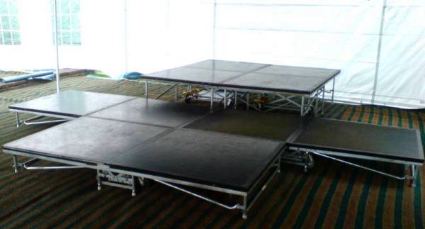 stage with drum riser for seven piece band